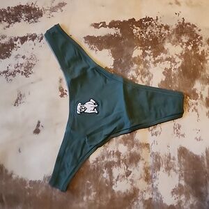 New Pink VS green thong with dog on front. Size: M